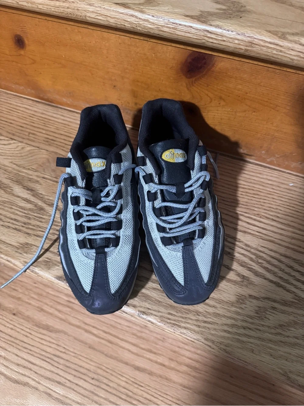 Nike Kids Black and Gray Sneakers with Yellow Logo